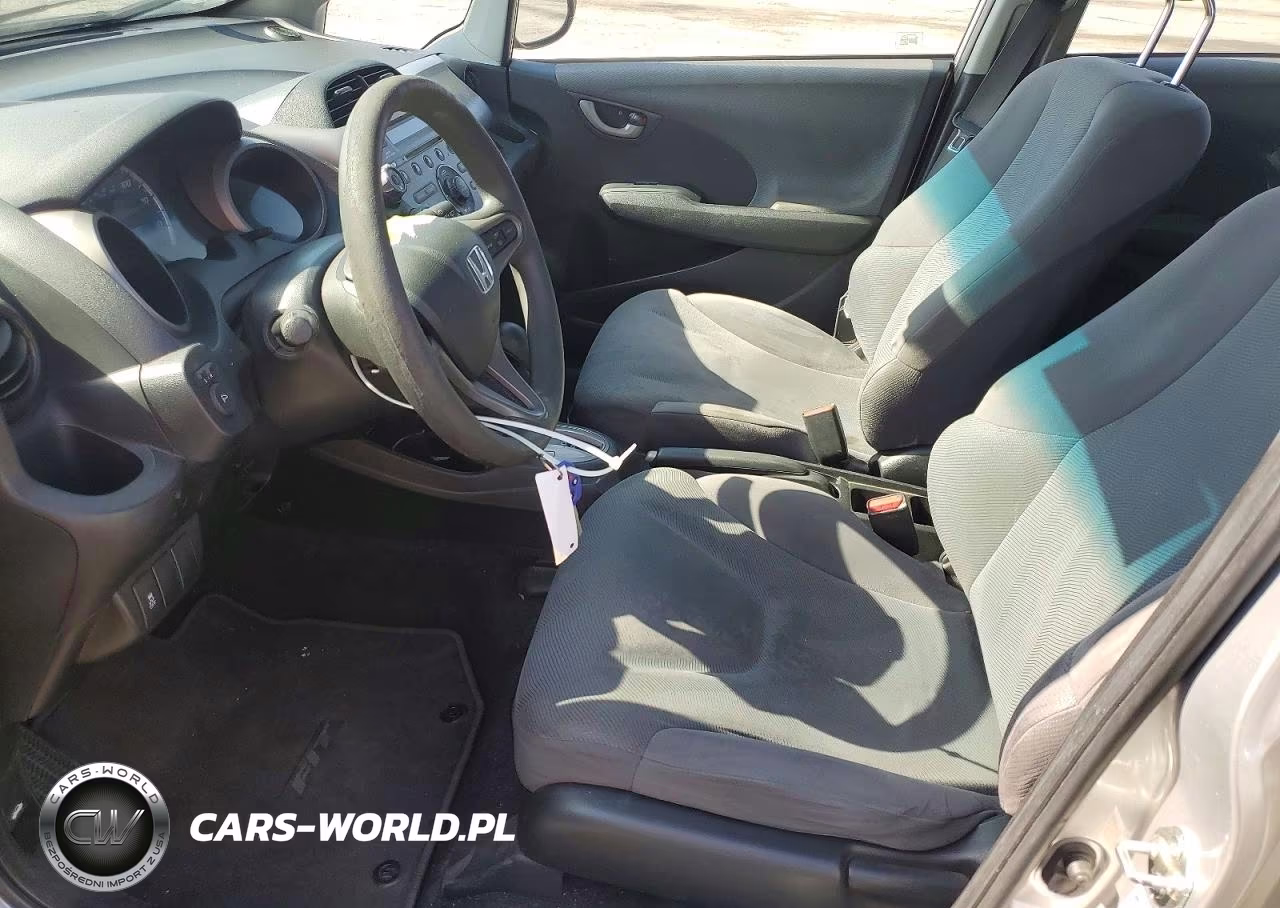 2011 Honda Fit VIN:JHMGE8H34BC023309 - 7