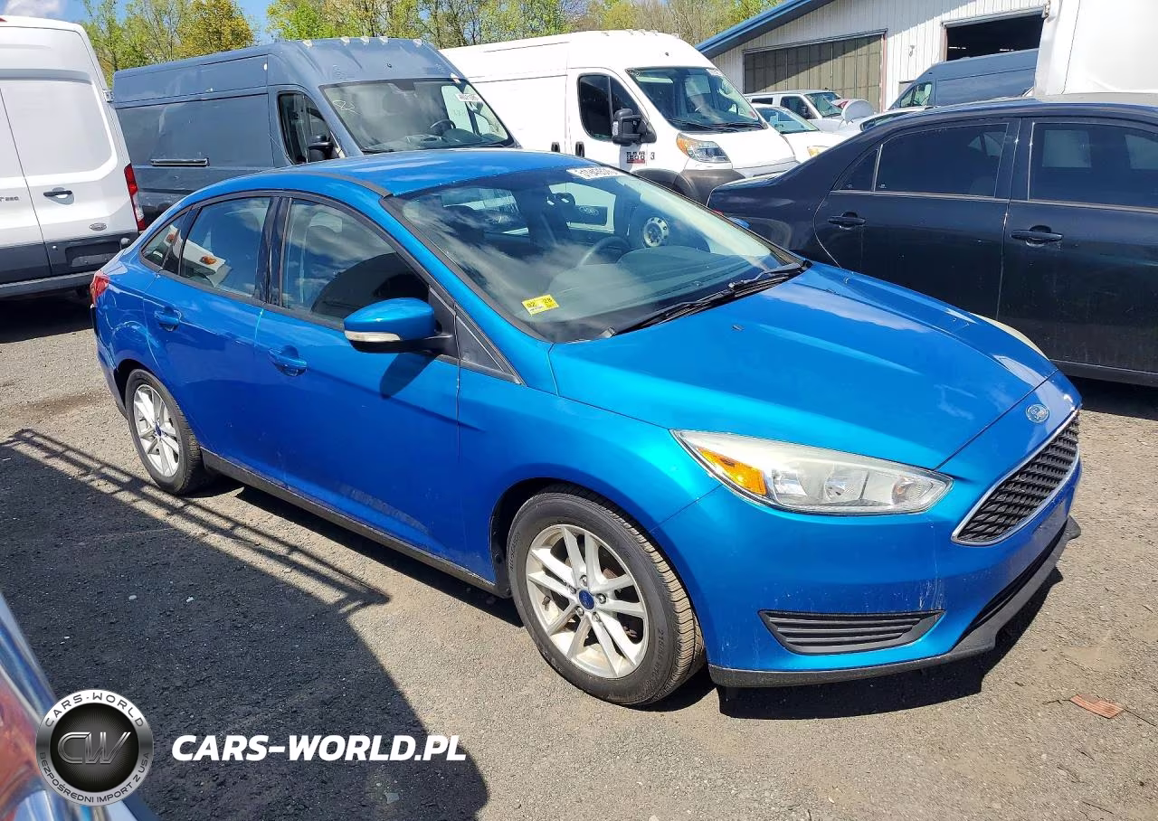 2015 Ford Focus VIN:1FADP3FE8FL213566 - 4