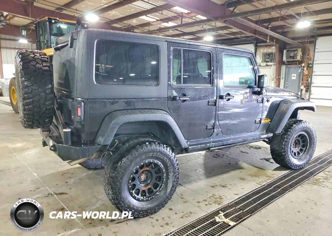 2015 Jeep Wrangler Unlimited Rubicon VIN:1C4BJWFGXFL730874 - 3