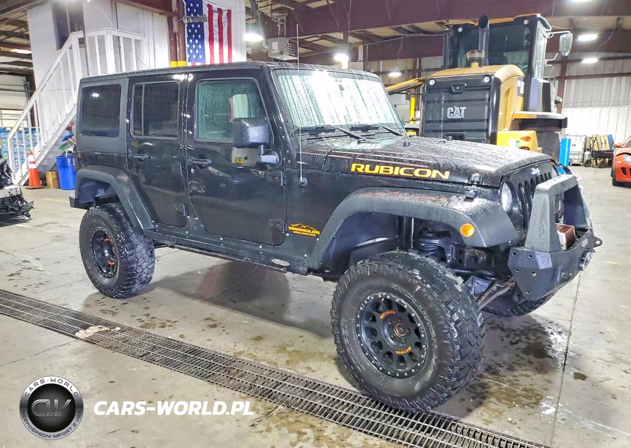 2015 Jeep Wrangler Unlimited Rubicon VIN:1C4BJWFGXFL730874 - 4
