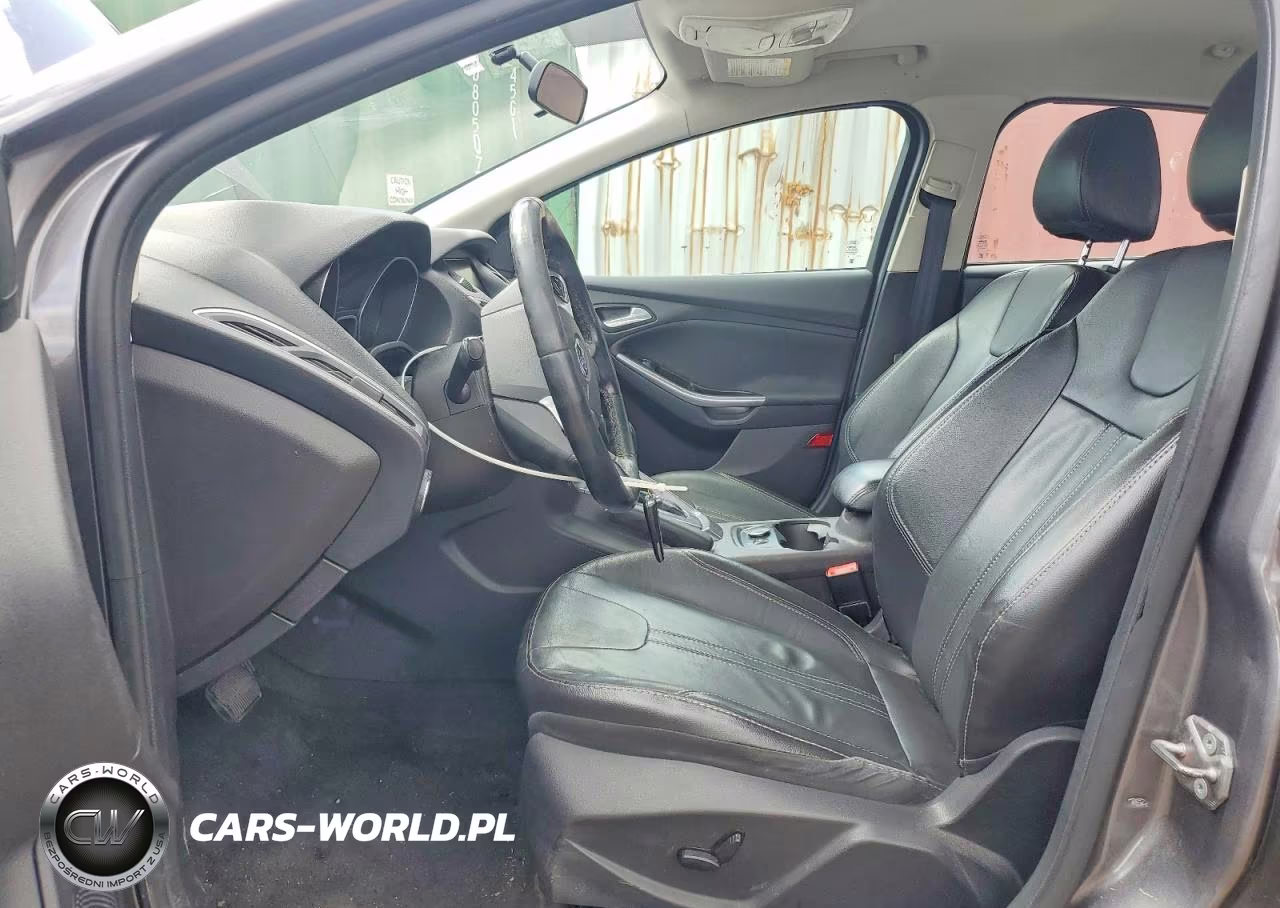 2014 Ford Focus Titanium VIN:1FADP3N24EL228894 - 7