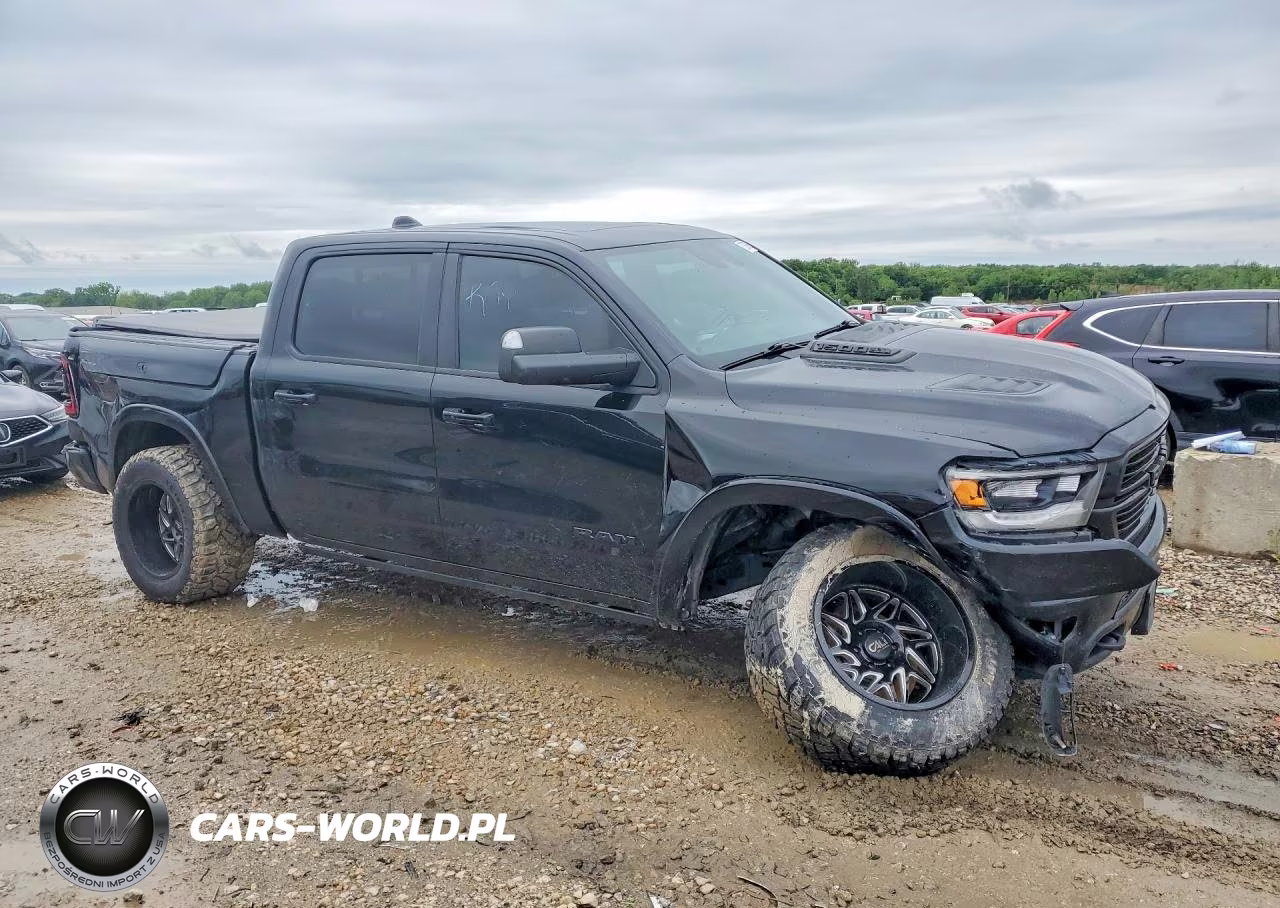 2019 Ram 1500 Laramie VIN:1C6SRFJT2KN634563 - 4