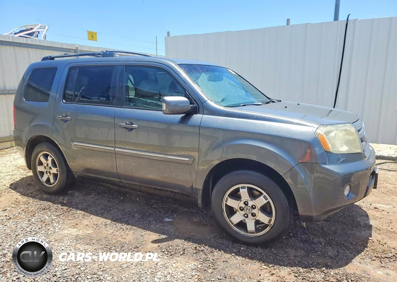 2011 Honda Pilot Touring VIN:5FNYF4H97BB048188 - 4