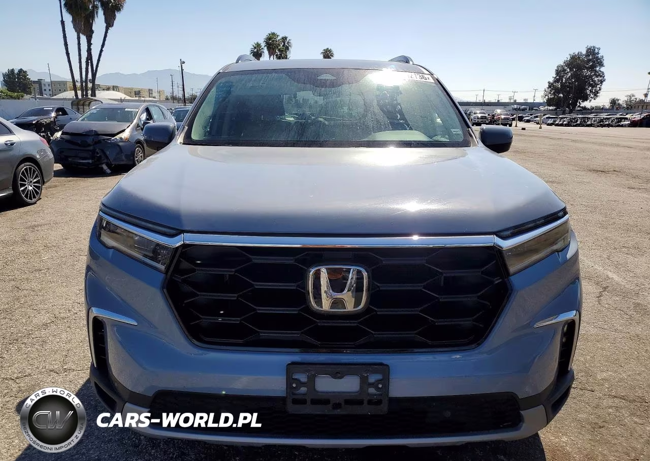 2025 Honda Pilot Touring VIN:5FNYG2H7XSB025312 - 5