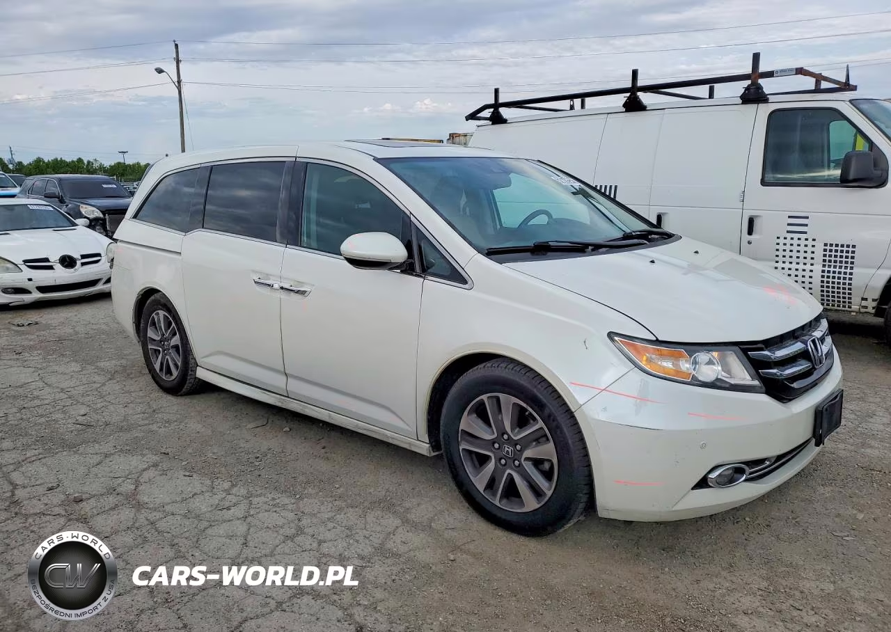 2014 Honda Odyssey Touring VIN:5FNRL5H93EB059177 - 4