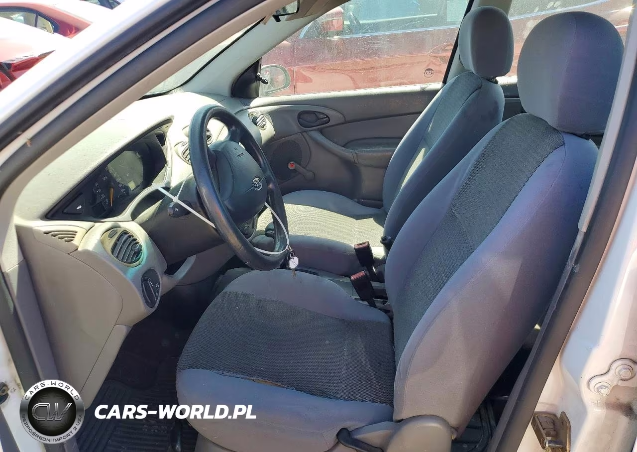 2004 Ford Focus Lx VIN:1FAFP33Z24W138827 - 7