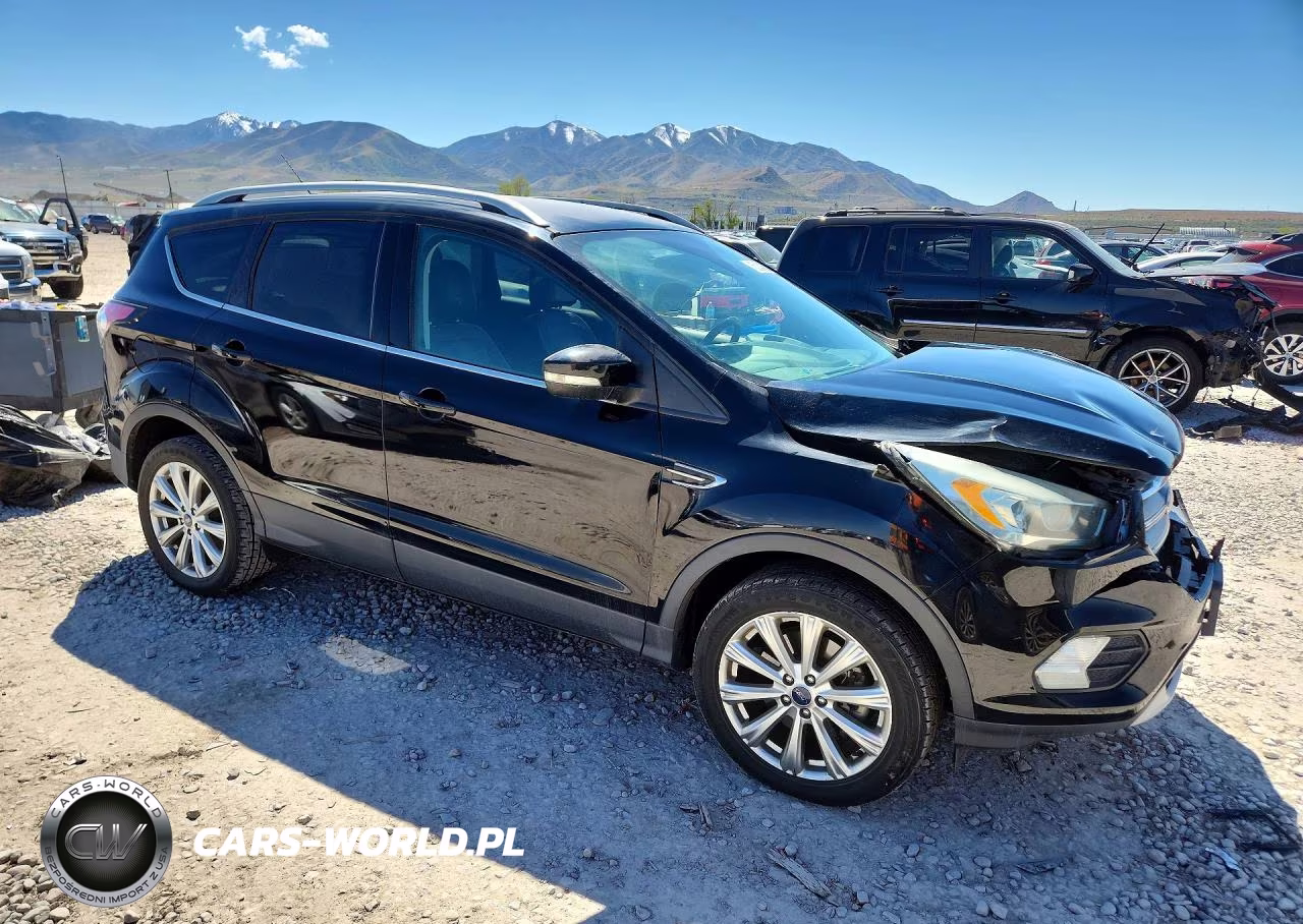 2017 Ford Escape Titanium VIN:1FMCU9JD9HUA26362 - 4