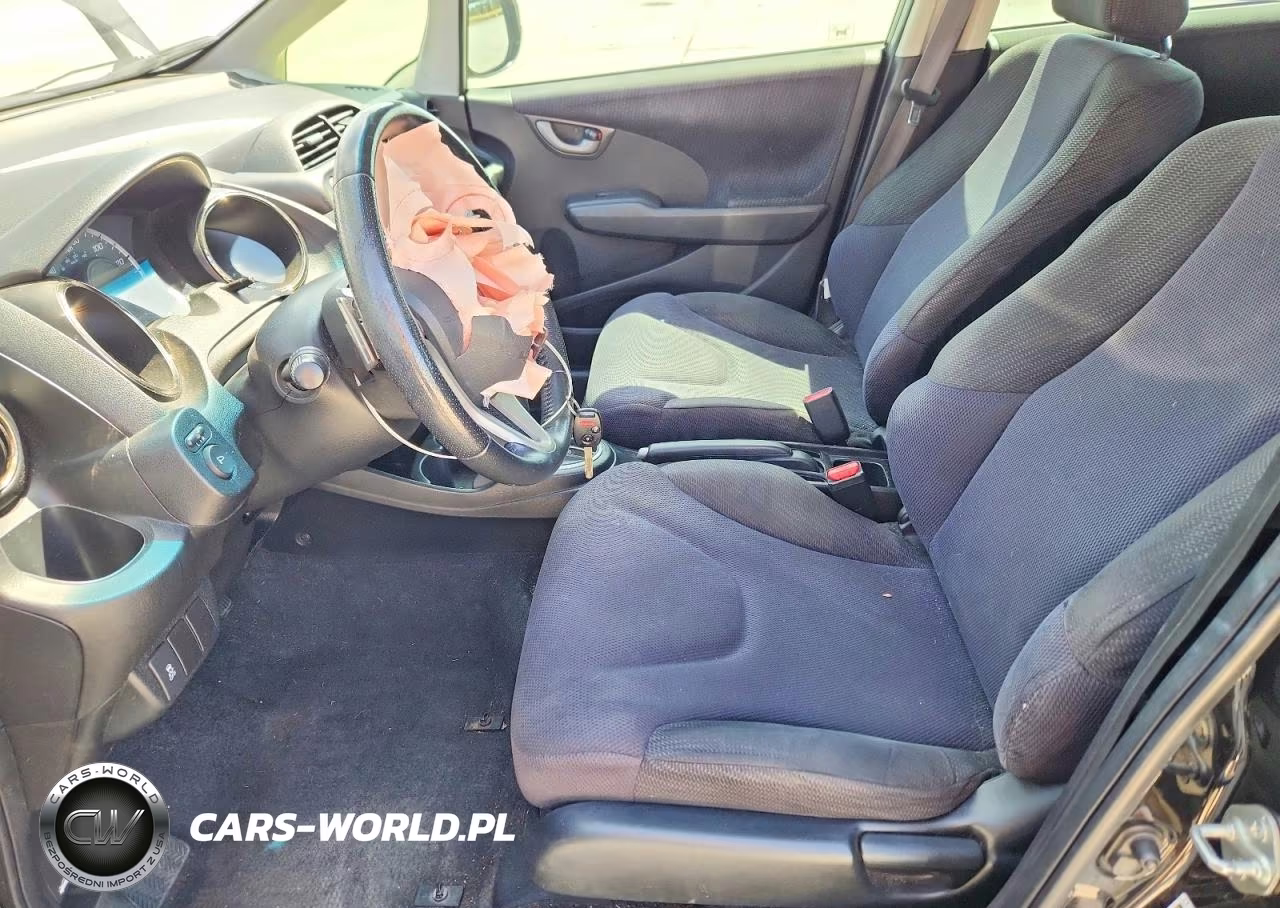 2013 Honda Fit Sport VIN:JHMGE8H54DC060638 - 7