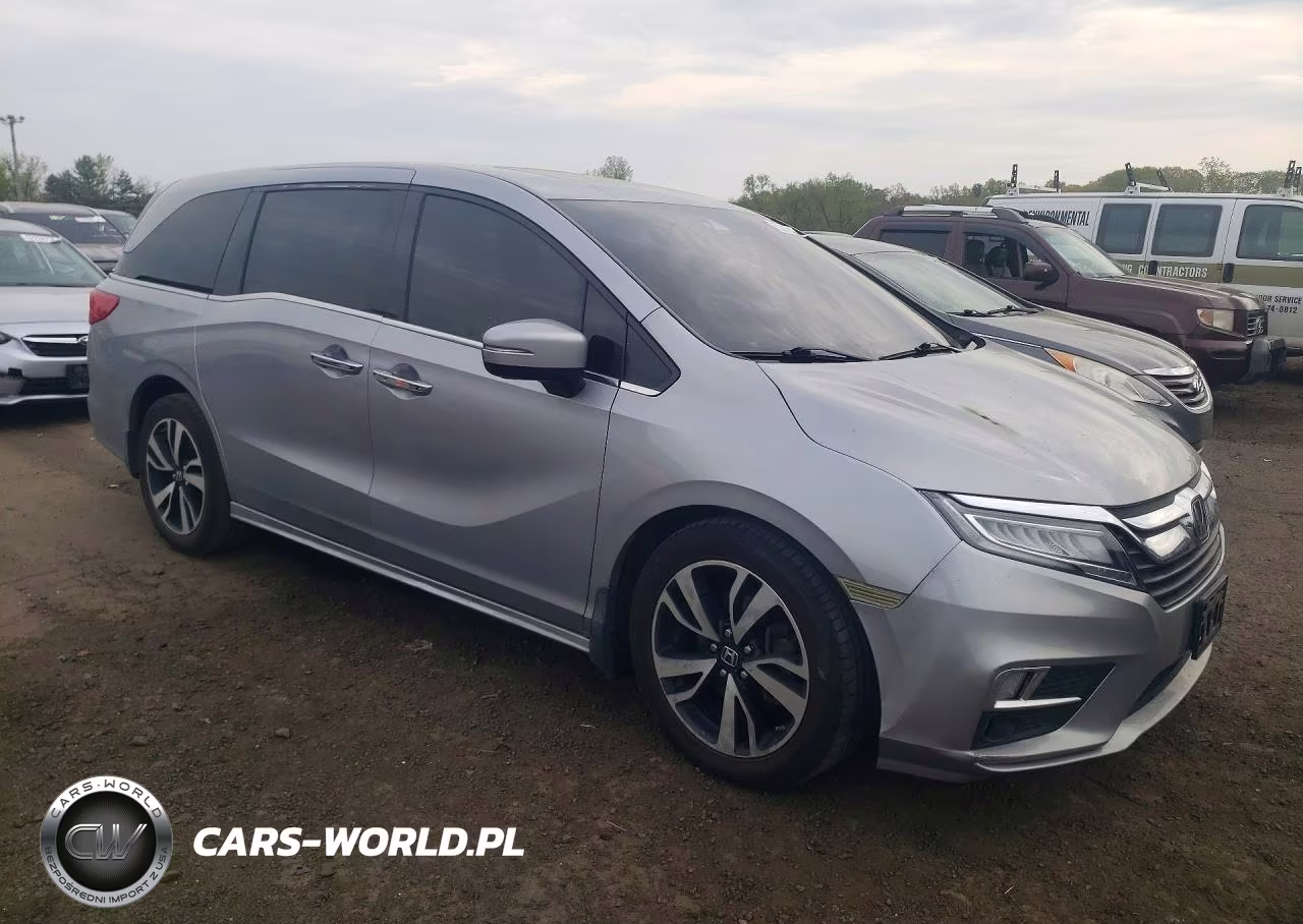 2018 Honda Odyssey Elite VIN:5FNRL6H94JB040668 - 4