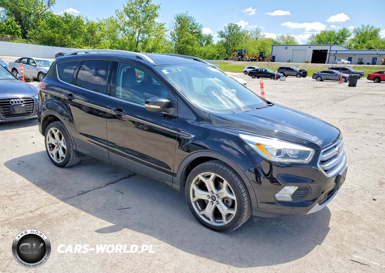 2017 Ford Escape Titanium VIN:1FMCU9J94HUA33649 - 4