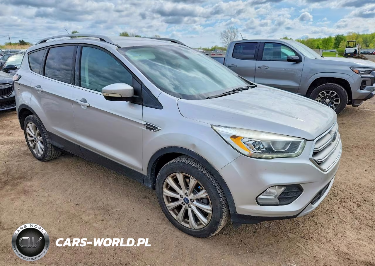 2017 Ford Escape Titanium VIN:1FMCU0J95HUE88408 - 4