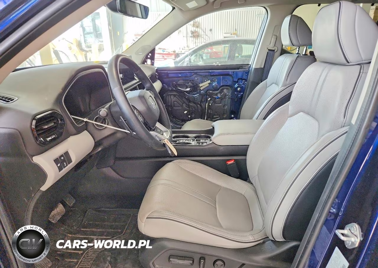 2023 Honda Pilot Elite VIN:5FNYG1H84PB035523 - 7