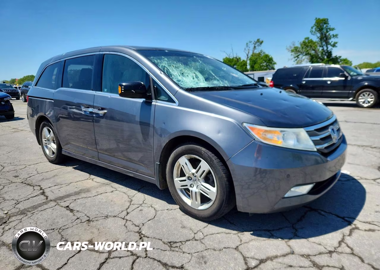 2012 Honda Odyssey Touring VIN:5FNRL5H98CB041576 - 4