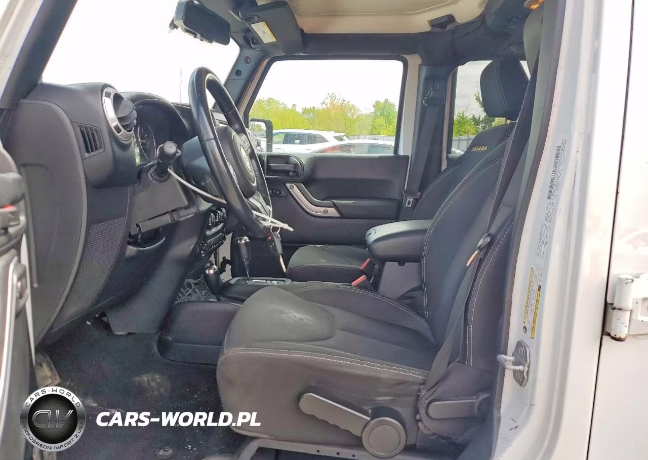 2014 Jeep Wrangler Unlimited Sahara VIN:1C4BJWEGXEL117069 - 7