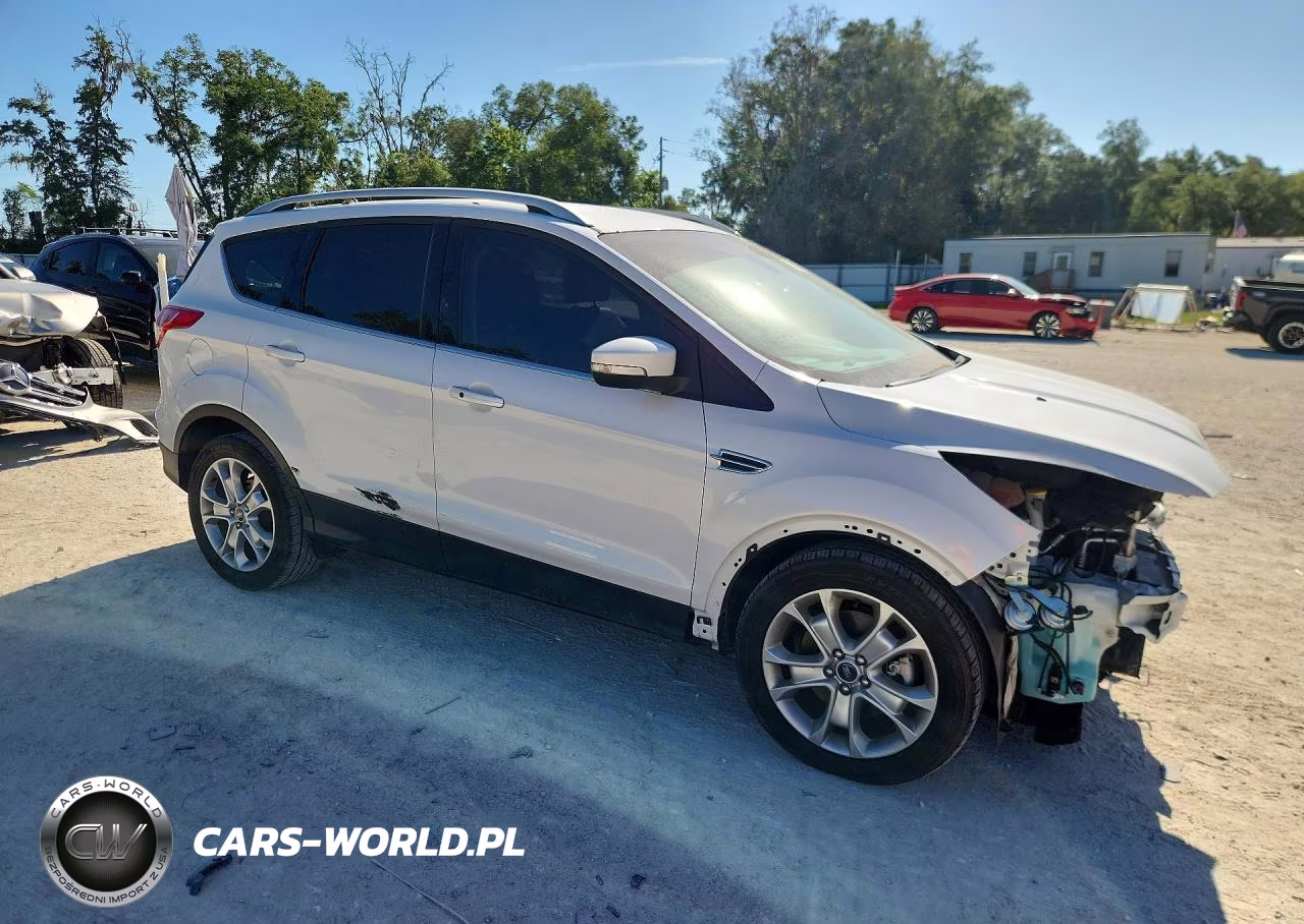 2016 Ford Escape Titanium VIN:1FMCU0J98GUA18016 - 4