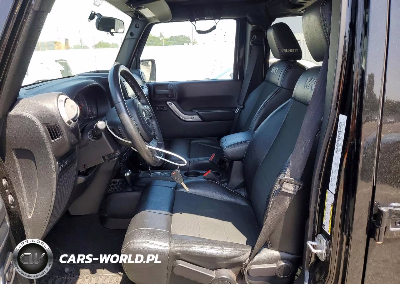 2012 Jeep Wrangler Unlimited Rubicon VIN:1C4BJWFG8CL230952 - 7