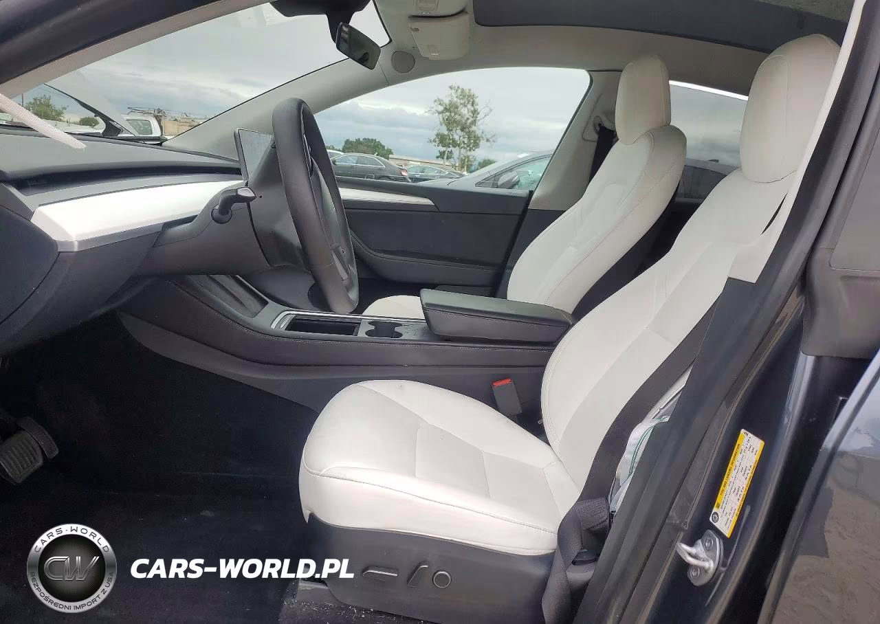 2023 Tesla Model Y VIN:7SAYGDEE2PF643958 - 7