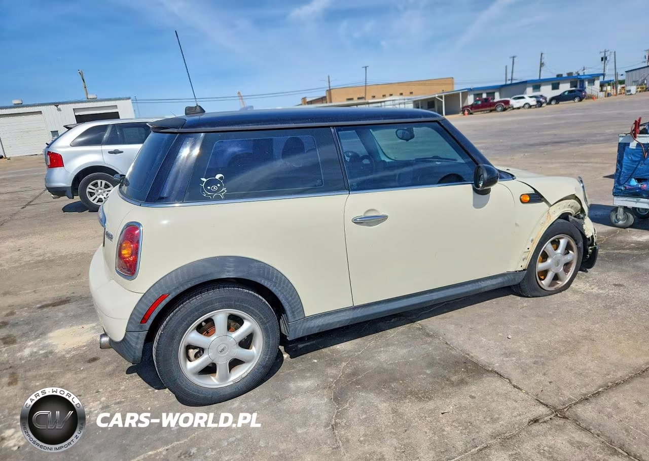 2009 Mini Cooper VIN:WMWMF33569TW70444 - 3