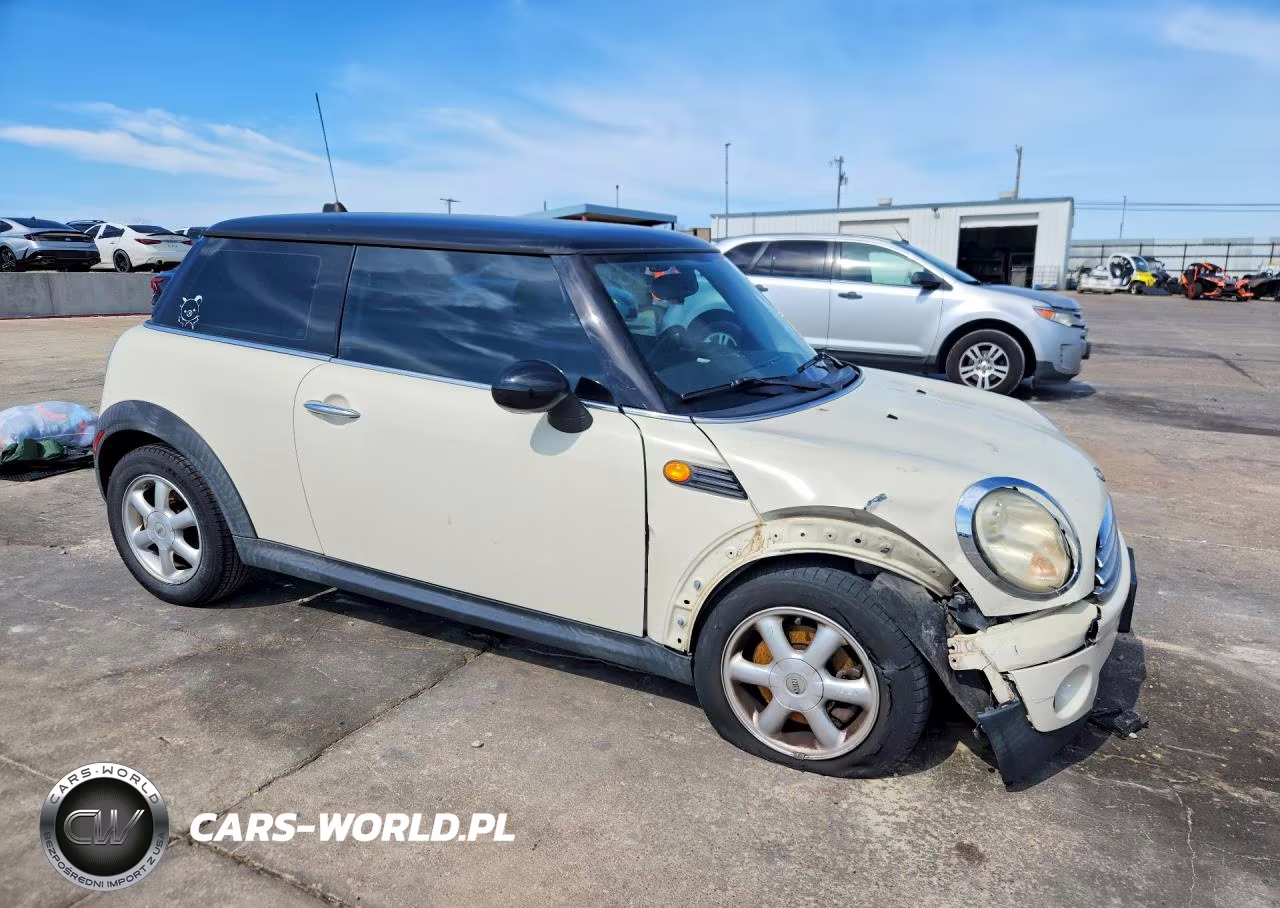 2009 Mini Cooper VIN:WMWMF33569TW70444 - 4