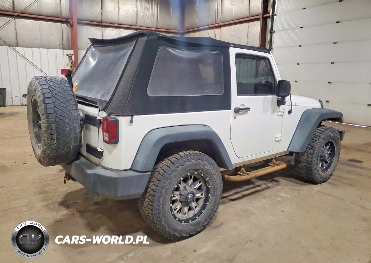 2012 Jeep Wrangler Sport VIN:1C4AJWAG3CL259682 - 3