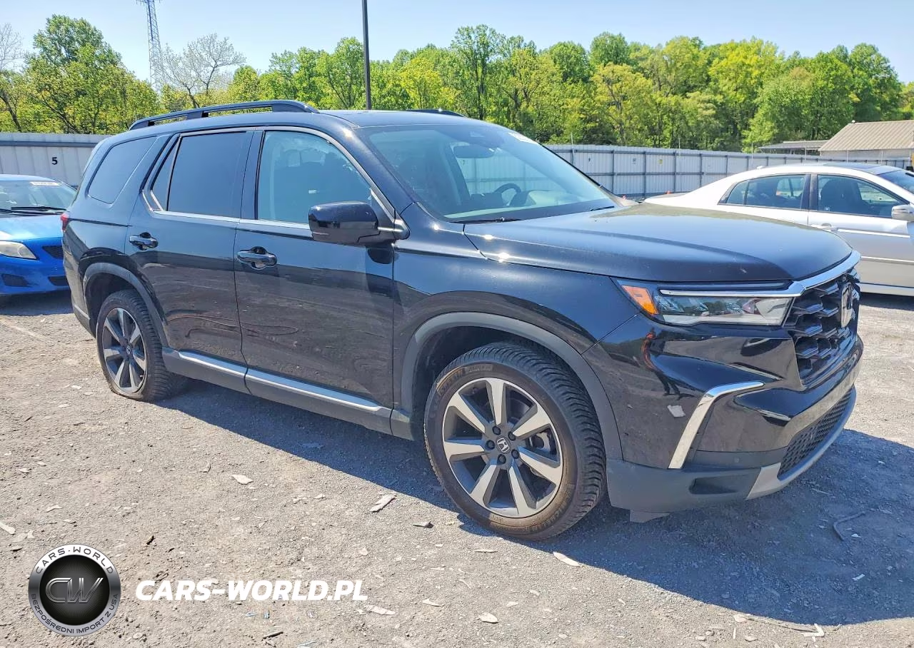 2023 Honda Pilot Elite VIN:5FNYG1H86PB048631 - 4