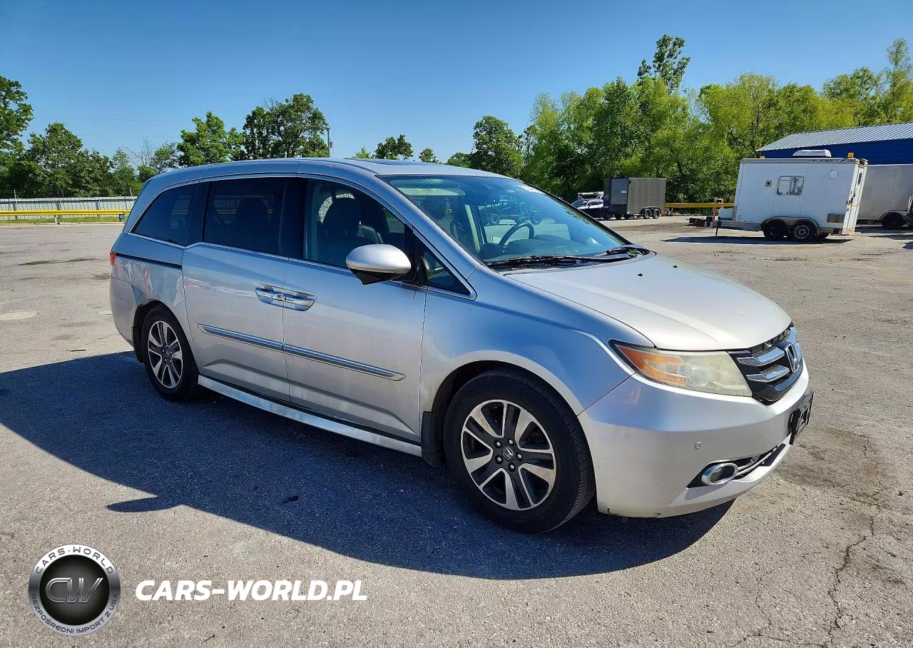 2014 Honda Odyssey Touring VIN:5FNRL5H91EB040840 - 4