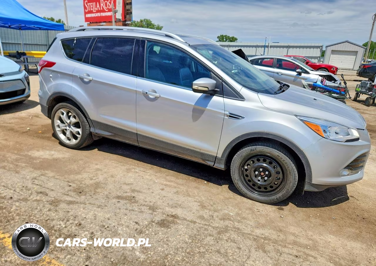 2016 Ford Escape Titanium VIN:1FMCU0J95GUC42649 - 4