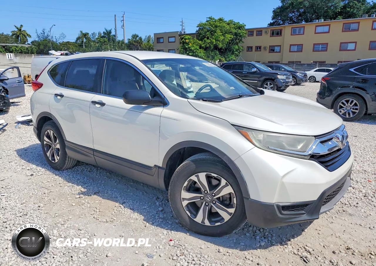 2017 Honda Cr-V Lx VIN:5J6RW5H37HL005590 - 4