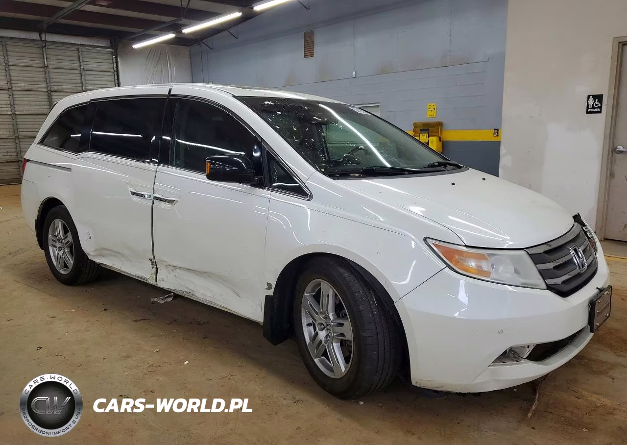 2012 Honda Odyssey Touring VIN:5FNRL5H91CB051415 - 4