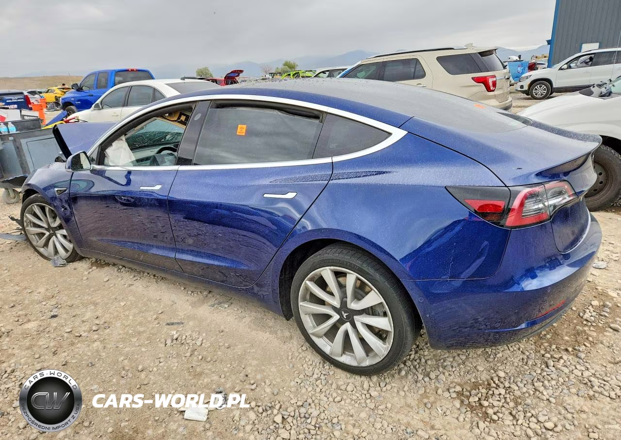 2018 Tesla Model 3 VIN:5YJ3E1EB4JF065001 - 2