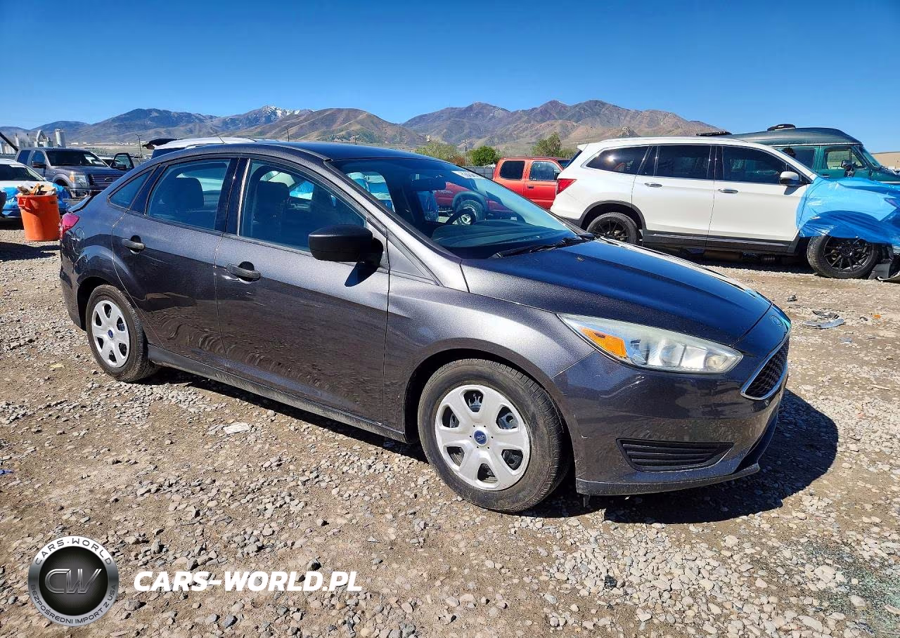 2015 Ford Focus S VIN:1FADP3E21FL306128 - 4