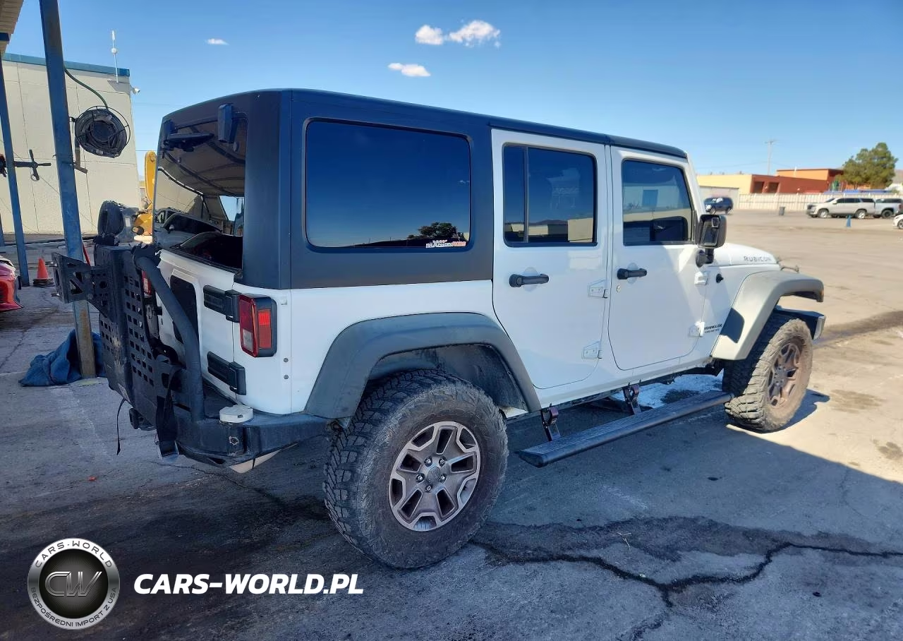 2013 Jeep Wrangler Unlimited Rubicon VIN:1C4BJWFGXDL638144 - 3