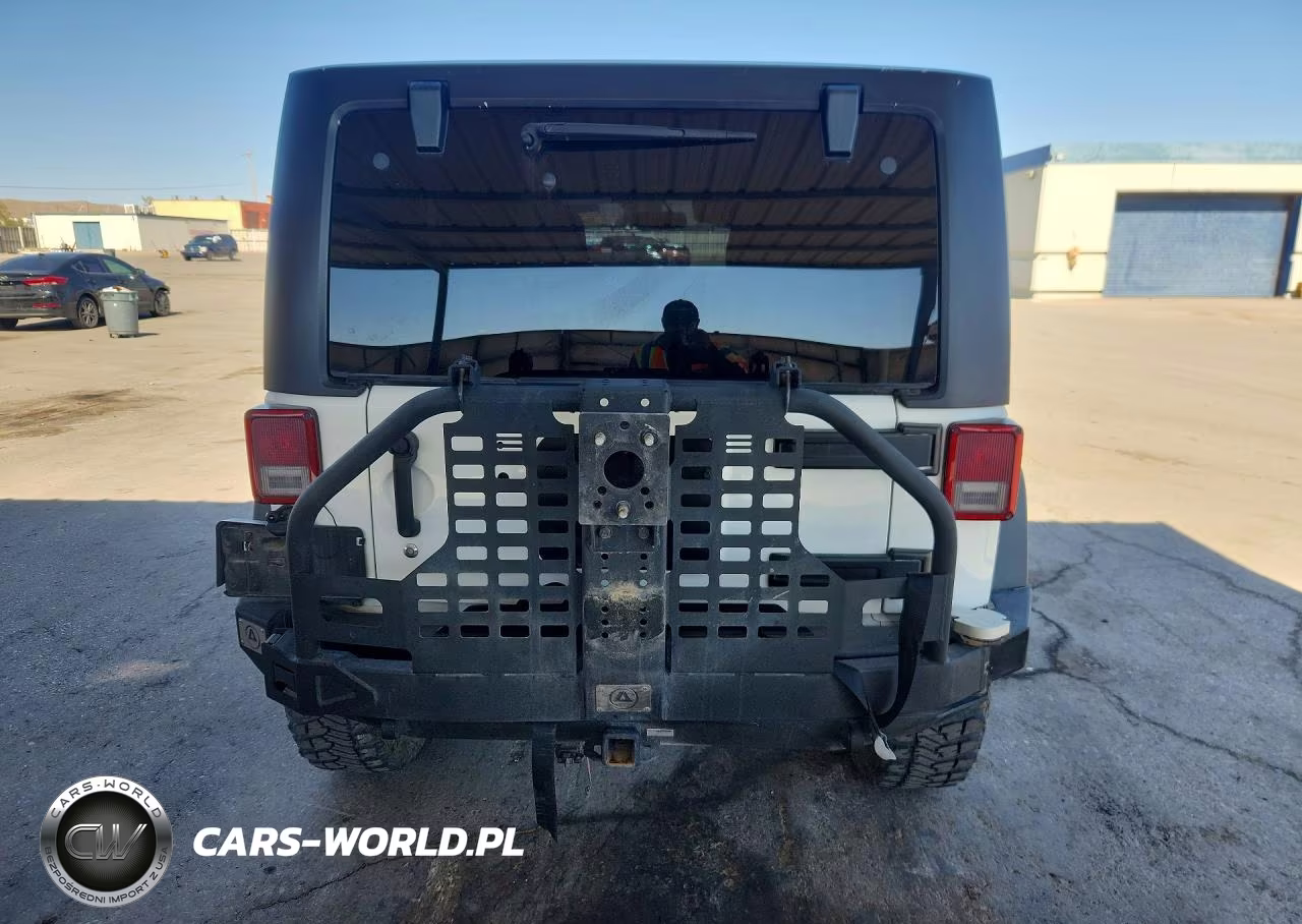 2013 Jeep Wrangler Unlimited Rubicon VIN:1C4BJWFGXDL638144 - 6