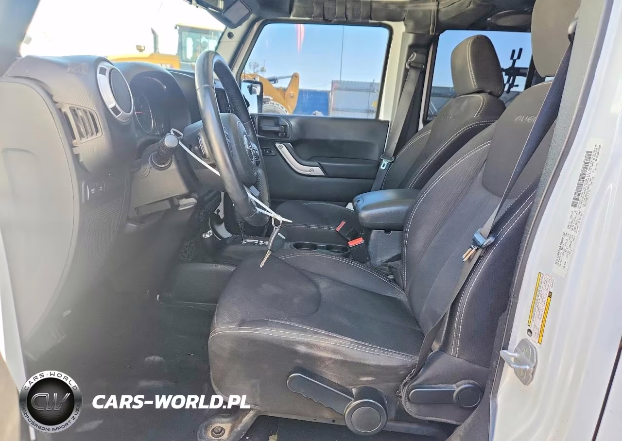 2013 Jeep Wrangler Unlimited Rubicon VIN:1C4BJWFGXDL638144 - 7