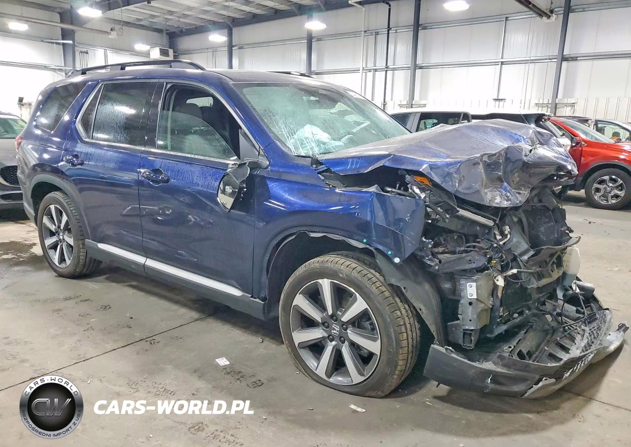 2023 Honda Pilot Touring VIN:5FNYG1H7XPB056447 - 4
