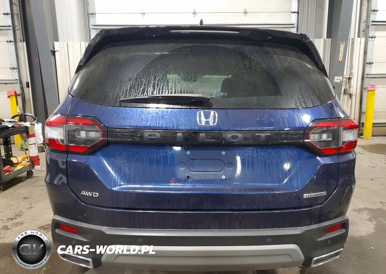 2023 Honda Pilot Touring VIN:5FNYG1H7XPB056447 - 6