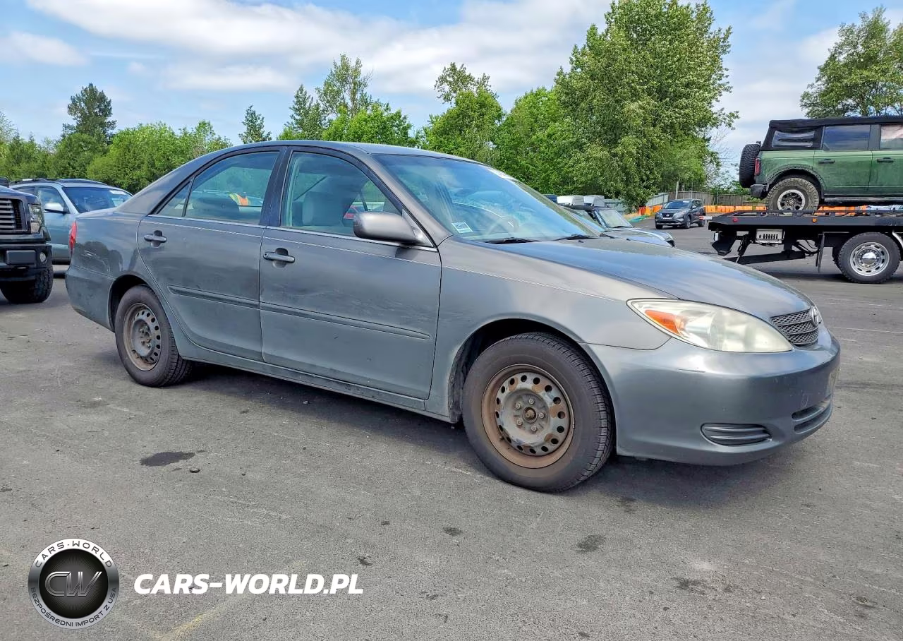 2004 Toyota Camry Le VIN:JTDBE32K740272562 - 4