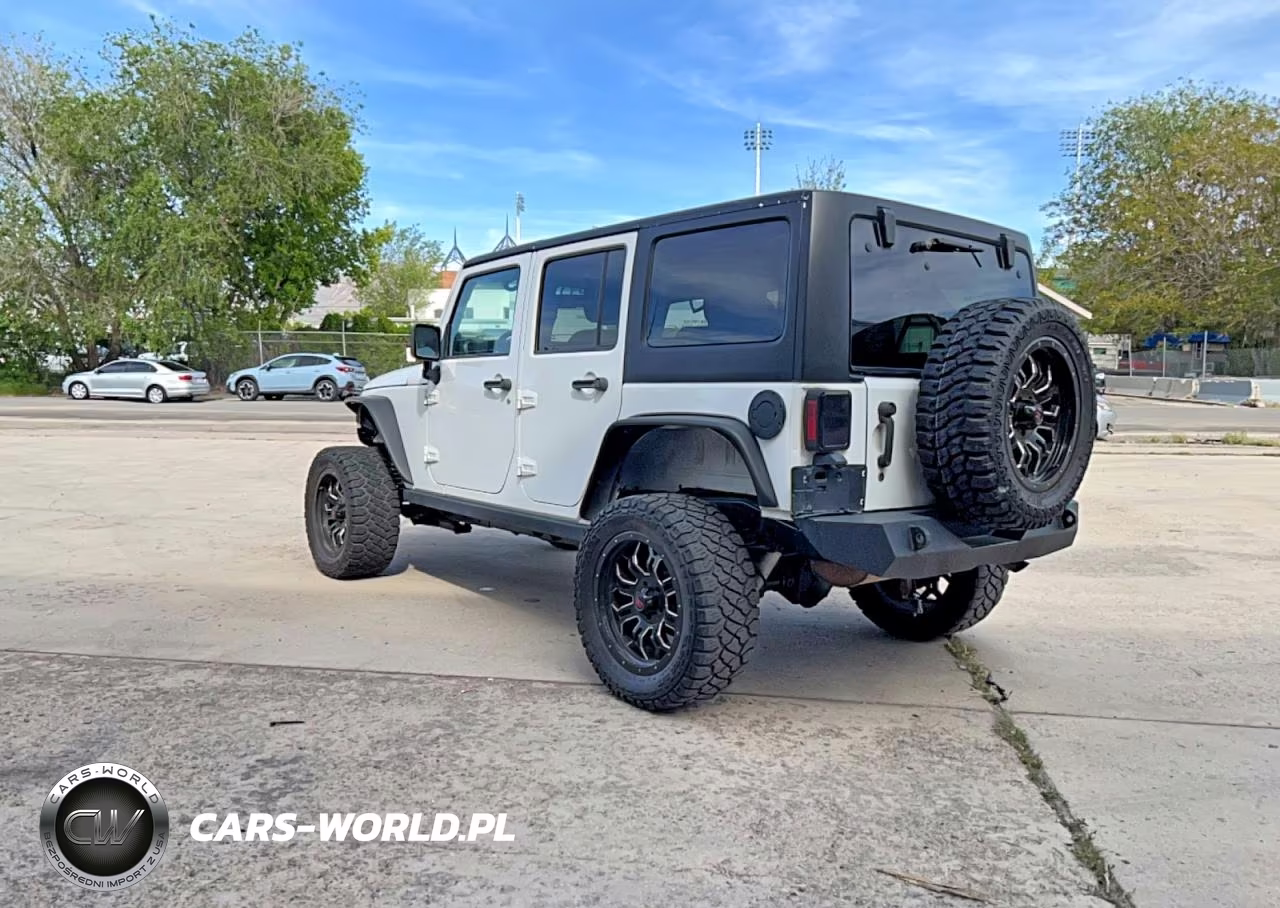 2013 Jeep Wrangler Unlimited Sport VIN:1C4HJWDG8DL601204 - 3
