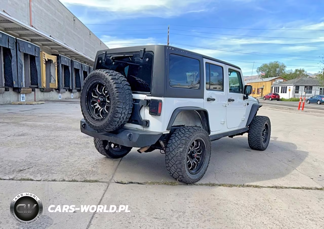 2013 Jeep Wrangler Unlimited Sport VIN:1C4HJWDG8DL601204 - 4