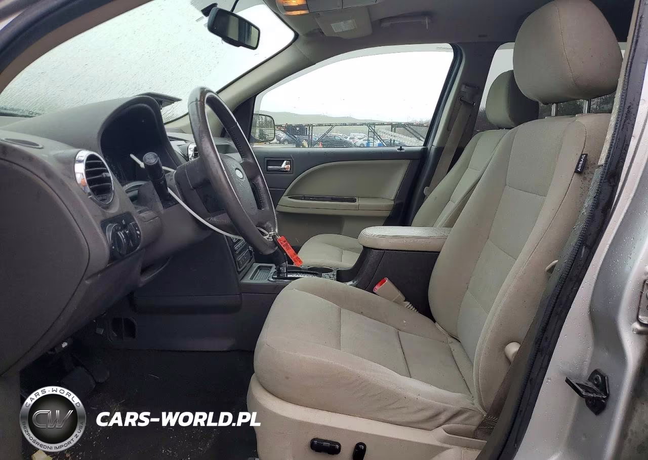 2009 Ford Taurus X Sel VIN:1FMDK02W09GA01663 - 7