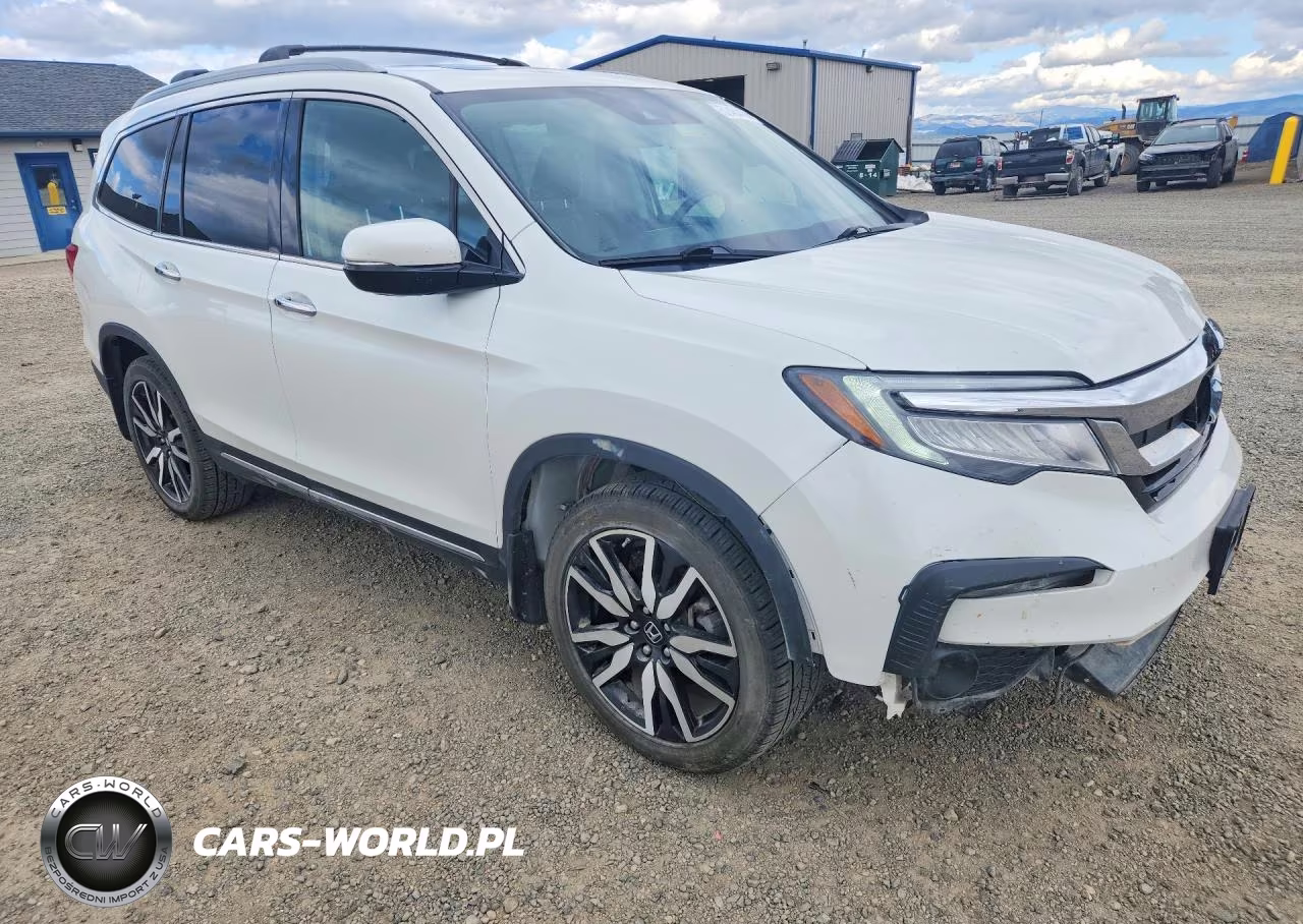 2022 Honda Pilot Touring VIN:5FNYF6H63NB057959 - 4