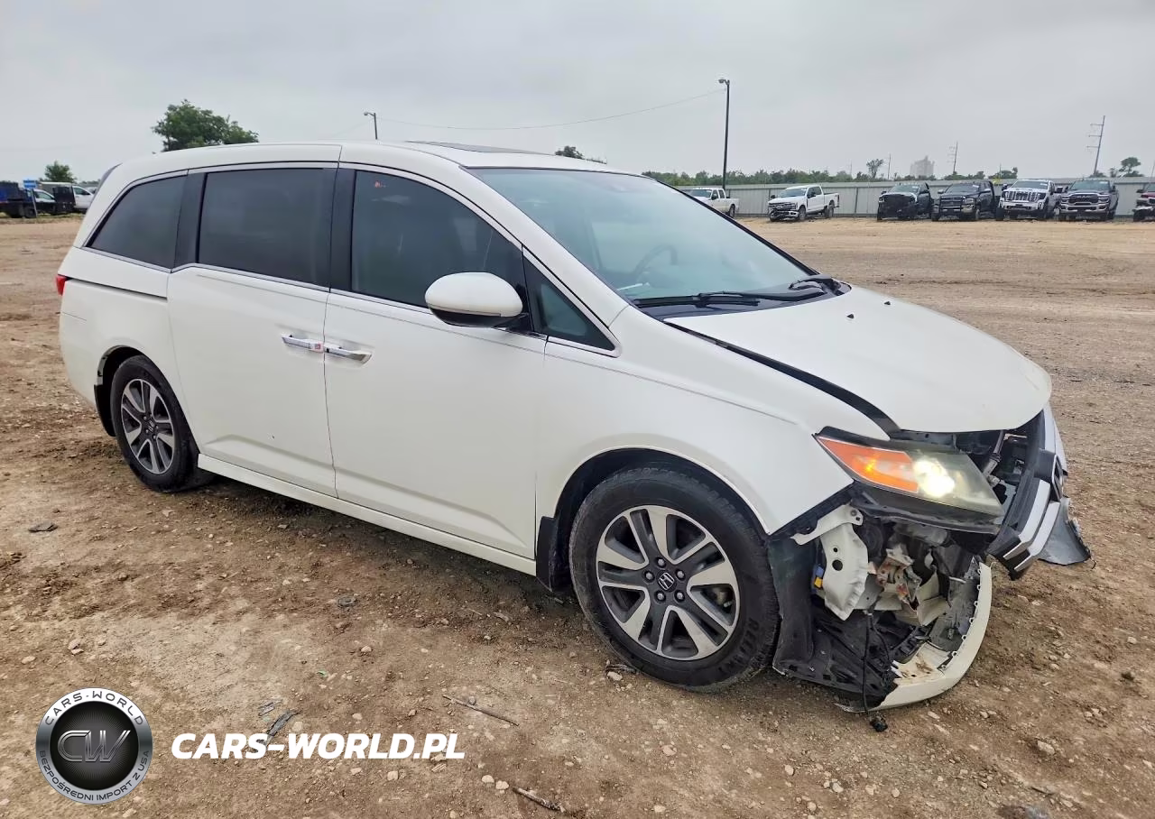 2017 Honda Odyssey Touring VIN:5FNRL5H90HB007977 - 4