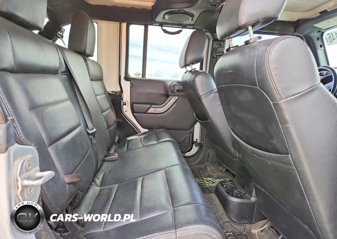 2012 Jeep Wrangler Unlimited Sport VIN:1C4BJWDG6CL215045 - 11