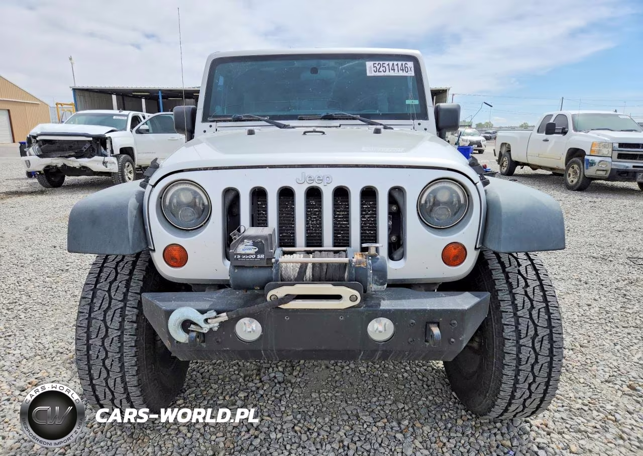 2012 Jeep Wrangler Unlimited Sport VIN:1C4BJWDG6CL215045 - 5