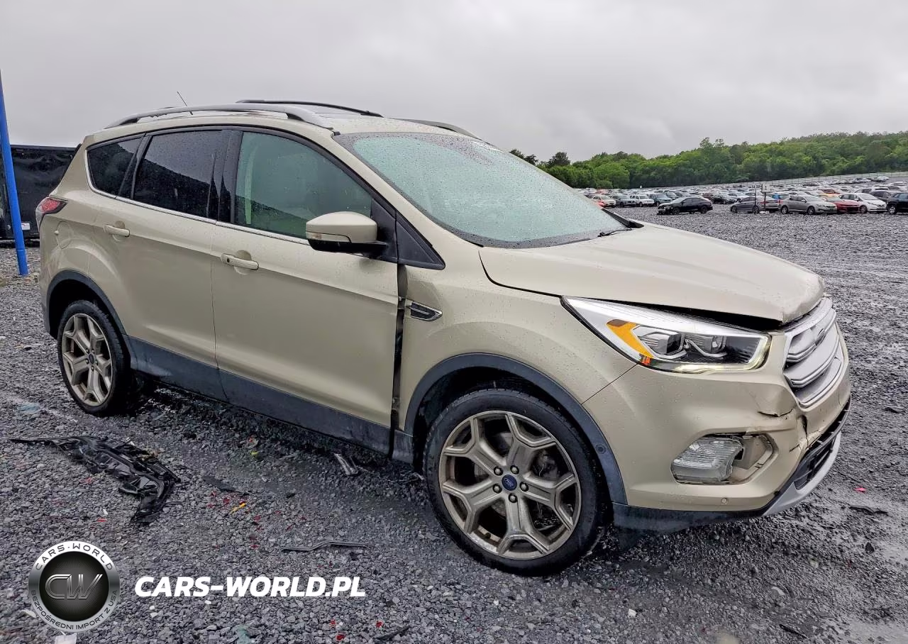 2017 Ford Escape Titanium VIN:1FMCU0J99HUB22712 - 4