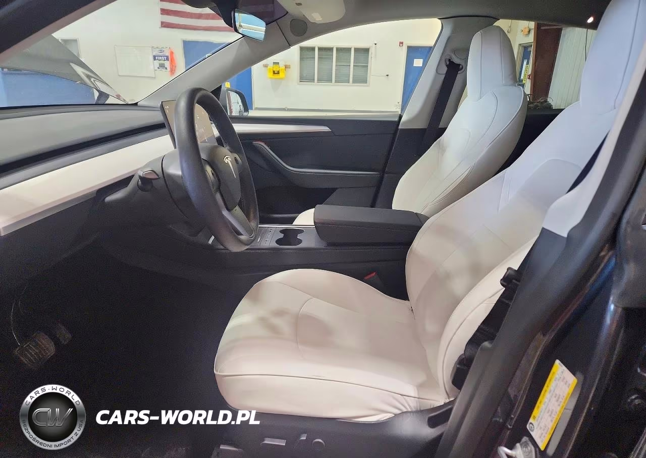 2023 Tesla Model Y VIN:7SAYGDEE9PF883248 - 7