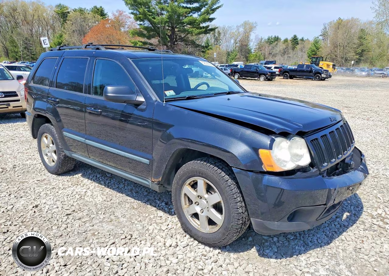 2009 Jeep Grand Cherokee Laredo VIN:1J8GR48K19C528541 - 4