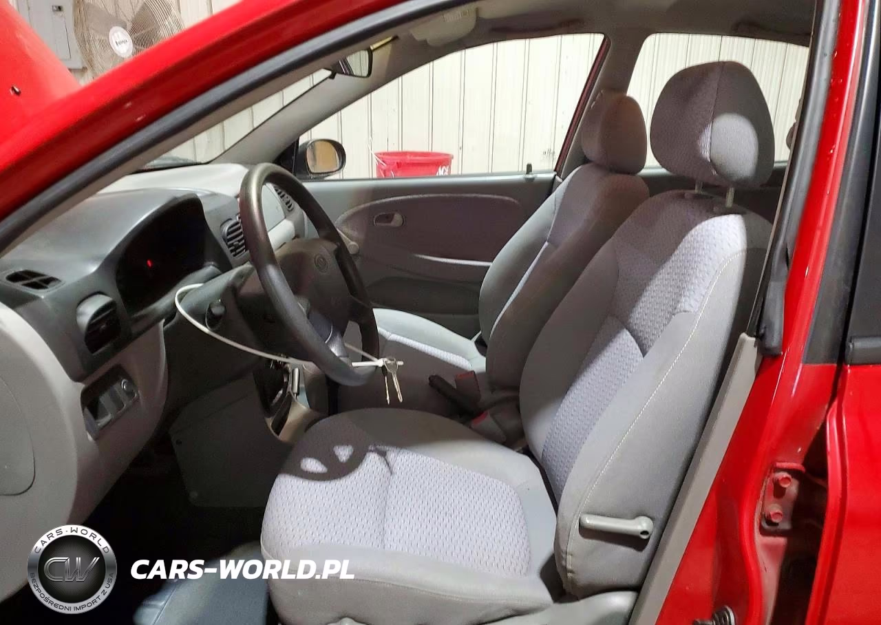 2002 Kia Rio Base VIN:KNADC123126175702 - 7