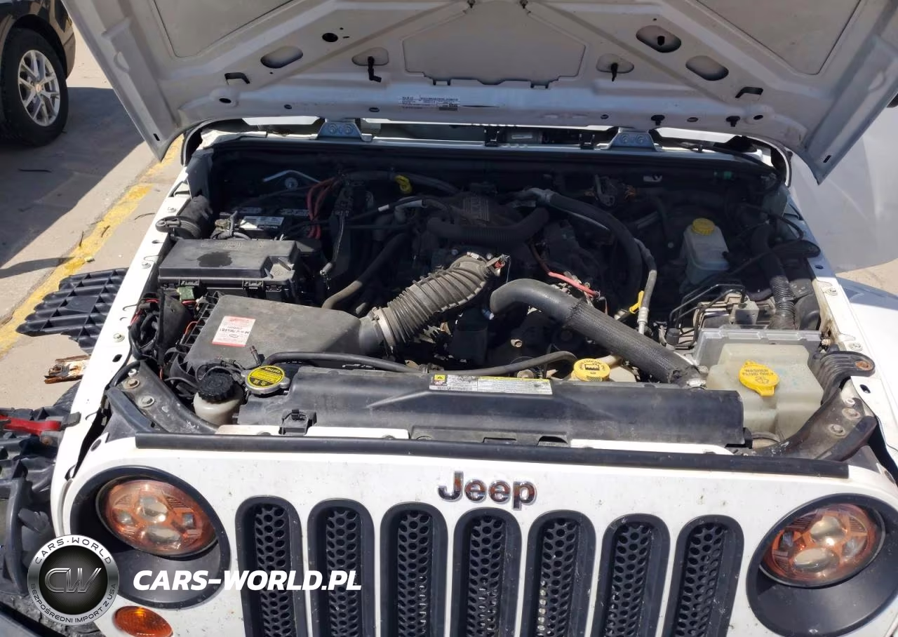 2011 Jeep Wrangler Unlimited Sahara VIN:1J4BA5H15BL592815 - 12
