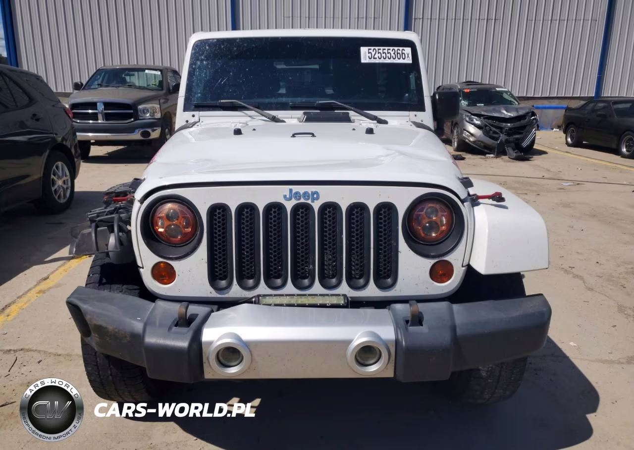 2011 Jeep Wrangler Unlimited Sahara VIN:1J4BA5H15BL592815 - 5